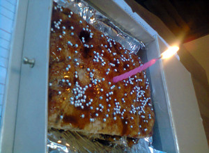 A picture of apple coffee cake with caramel sauce.
