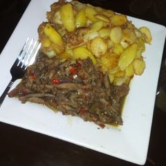 Fried potatoes with beef sauce A picture of Fried potatoes with beef sauce.