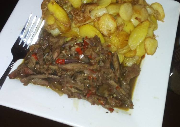 Fried potatoes with beef sauce