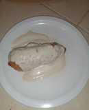Rollitos de pollo, bañadas de salsa bechamel