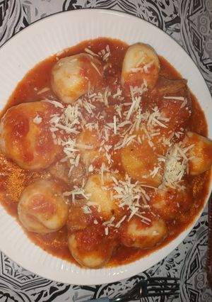 Una foto de Ñoquis rellenos de queso