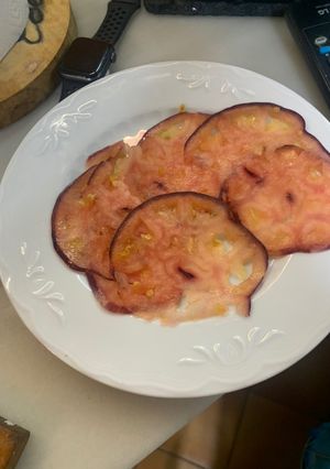 Una foto de Tomate con ajos
