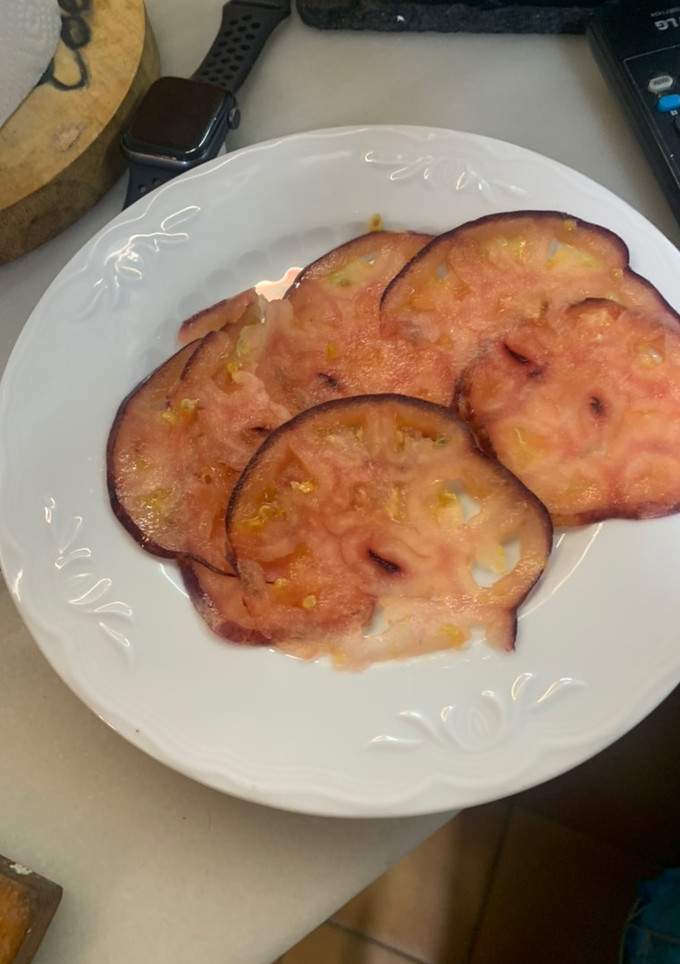 Una foto de Tomate con ajos