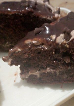 A picture of Chocolate moist brownies with ice cream.