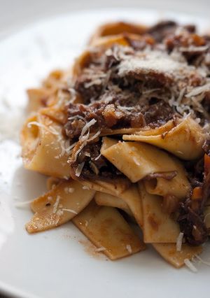A picture of Tagliatelle with bolognese.
