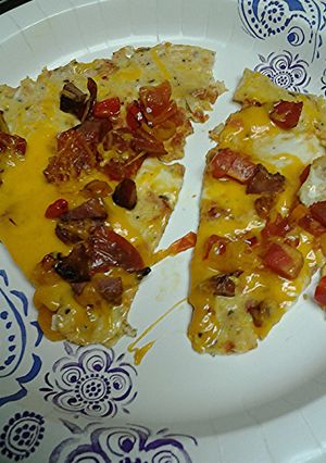 A picture of pizza egg omelet.