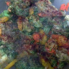 A picture of spiced mixed veggies in ghee.