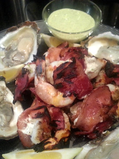 A picture of Grilled Jumbo Stuffed Shrimp Wrapped in Bacon.
