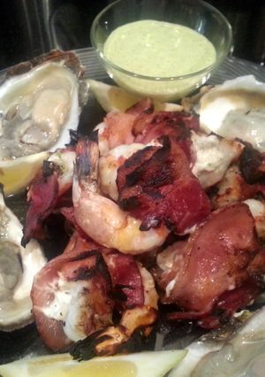 A picture of Grilled Jumbo Stuffed Shrimp Wrapped in Bacon.
