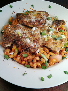 A picture of Pan Seared pork chops with a Quick Pan Sauced Pasta.