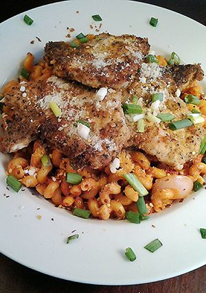 A picture of Pan Seared pork chops with a Quick Pan Sauced Pasta.