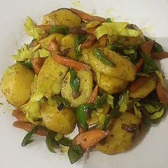 A picture of Potato With vegetables.
