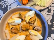 Una foto de dip de mejillones