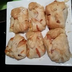A picture of Bacon and cheese wrap.