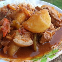 A picture of Rice and pork stew.