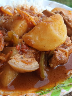A picture of Rice and pork stew.