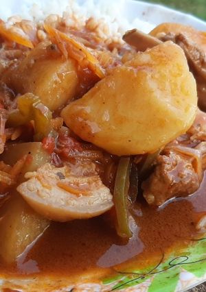 A picture of Rice and pork stew.