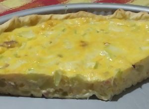 Una foto de Tarta rápida de zucchini lomito y queso