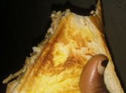 A picture of egg and sardine sandwich