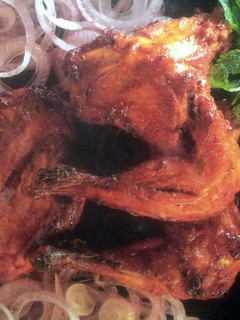 A picture of indian tandoori chicken.