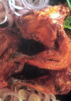 A picture of indian tandoori chicken.