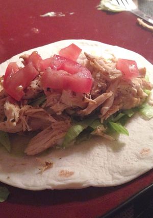 A picture of Easy Slow Cooked Pulled Chicken Tacos.