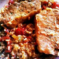 A picture of Pork Chop and Brown Rice Skillet Dinner.