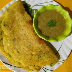 A picture of Muga chakuli pitha(moong ka chhila).