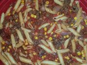 A picture of ground beef and penne