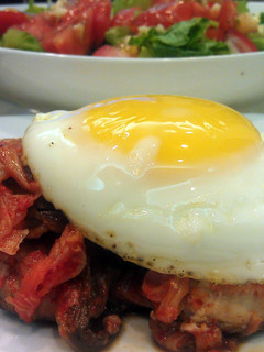 A picture of Kimchi chicken with egg.