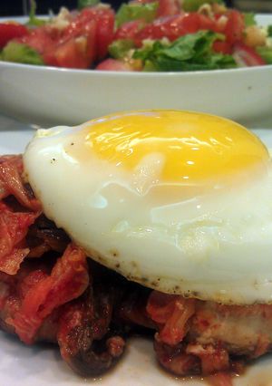 A picture of Kimchi chicken with egg.