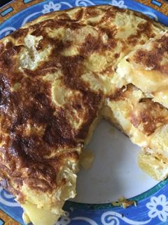 Una foto de Tortilla rellena con papas al horno