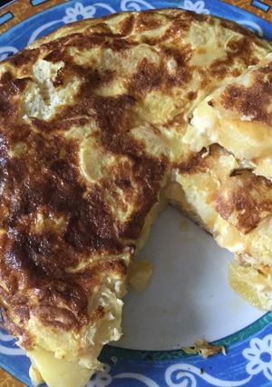 Una foto de Tortilla rellena con papas al horno