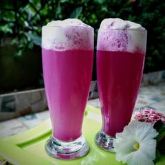 A picture of Jamun, soda and ice cream Mocktail.
