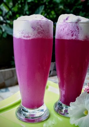 A picture of Jamun, soda and ice cream Mocktail.