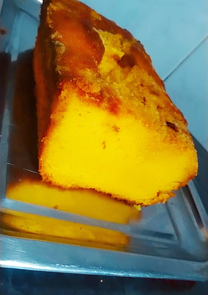 Una foto de Budín húmedo de naranja y pomelo