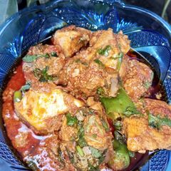 Boneless chicken tandoori karahi A picture of Boneless chicken tandoori karahi.