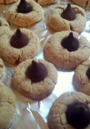 A picture of peanut butter blossom cookies.