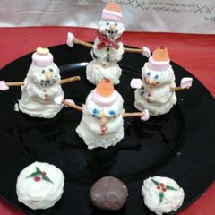 A picture of Ladybirds Christmas Snowman and Christmas Pudding Truffles.