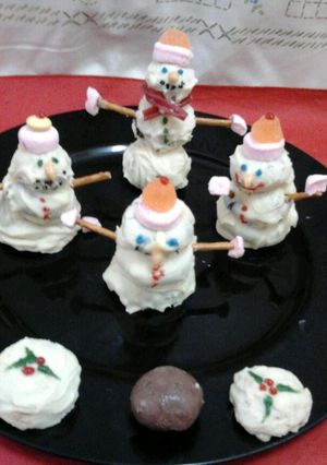 A picture of Ladybirds Christmas Snowman and Christmas Pudding Truffles.