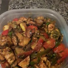 A picture of Chicken breast with patty pan & basil.