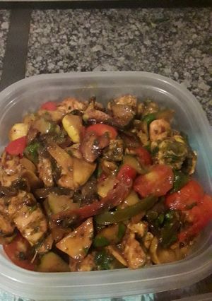 A picture of Chicken breast with patty pan & basil.