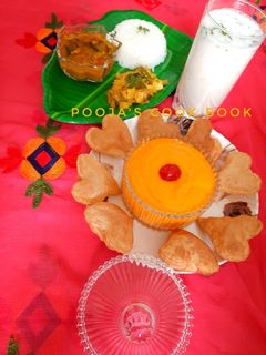 आमरस पुरी (aamras puri recipe in marathi) रेसिपी चे मुख्य फोटो