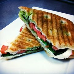 A picture of Tomato Mozzrella with basil panini.