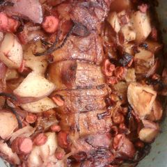 A picture of Bacon wrapped pork tenderloin.