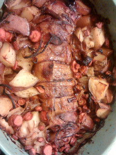 A picture of Bacon wrapped pork tenderloin.