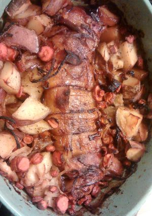 A picture of Bacon wrapped pork tenderloin.