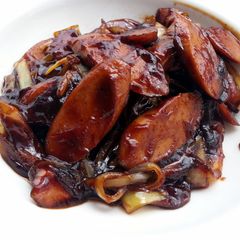A picture of Sausage And Onion In BBQ Sauce.