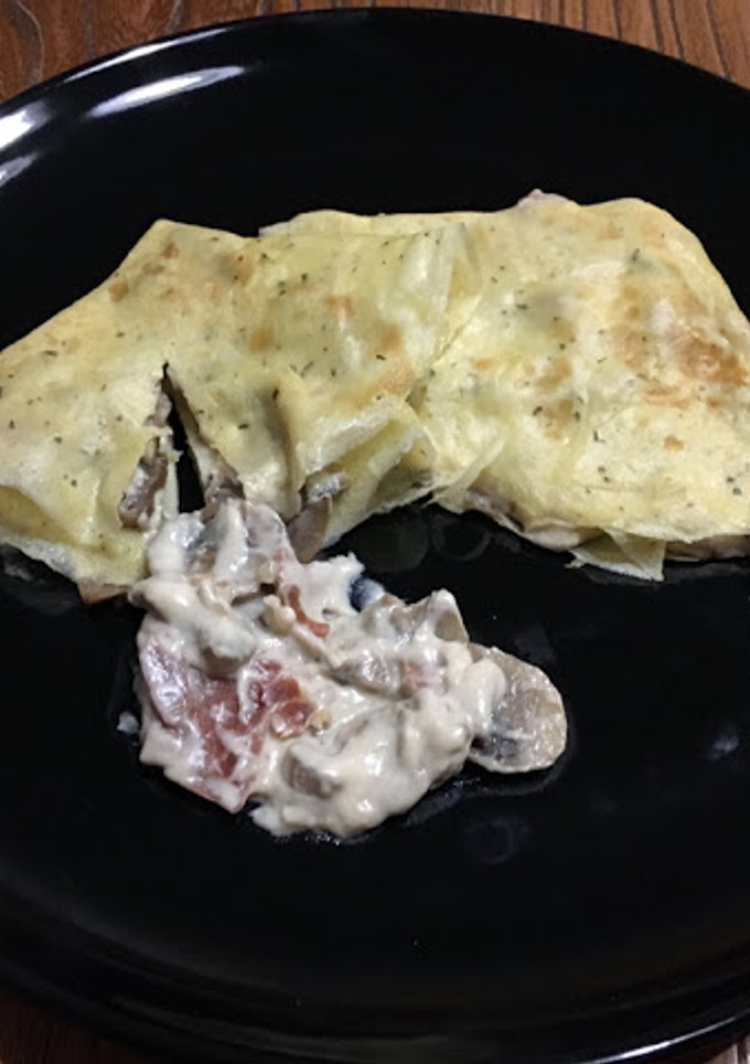 Una foto de Crepes de champiñones y jamón serrano