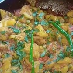 A picture of Aloo gobhi mater veg.